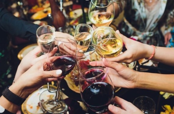 Group toast all fresh chilled wines and glasses new energy